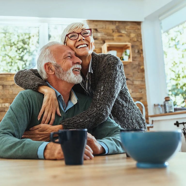 Elderly Couple at table