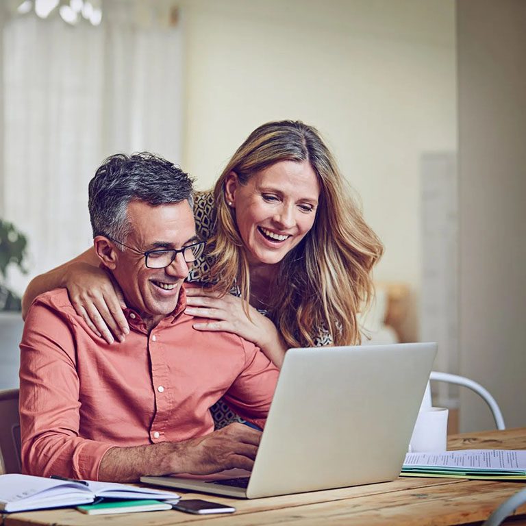 Couple at laptop