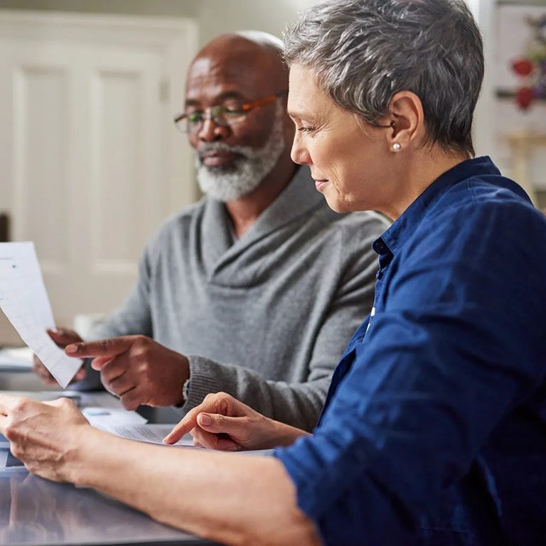 Elderly Couple going thru documents